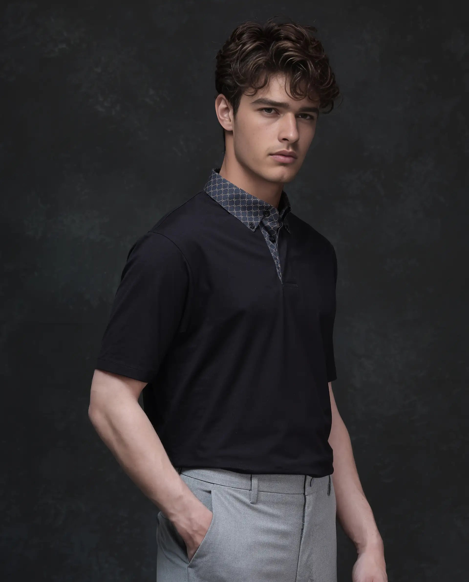 Rare Rabbit Men's Rinz Black Cotton Blend Fabric Half Sleeve Spread Collar Regular Fit Plain Polo